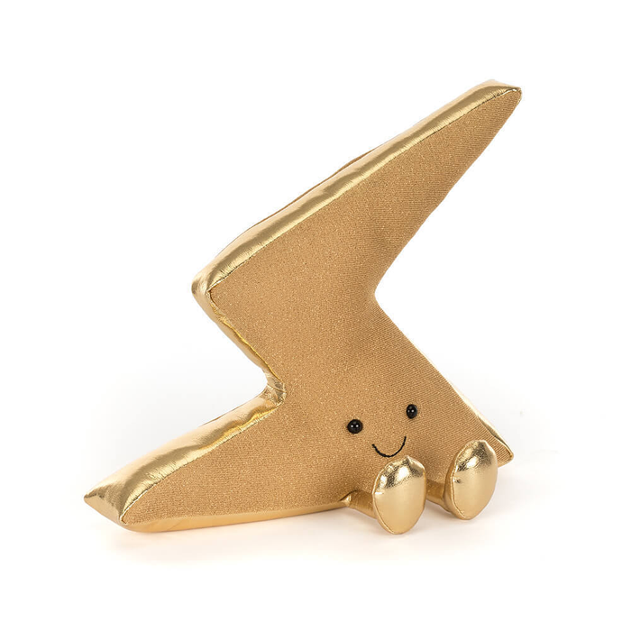 Gold soft toy resembling a lightning bolt with smiling face, on a white background