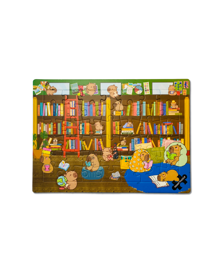 At The Library - 42 brikker børnepuslespil +3 år fra Penny Puzzle