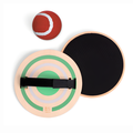 Wooden catch ball device with a red and white ball on a white background