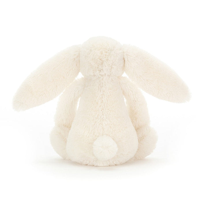 White plush bunny toy on a white background