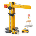 A wooden construction play set featuring a yellow crane with a movable arm and platform, two construction vehicles, and a lifting hook.