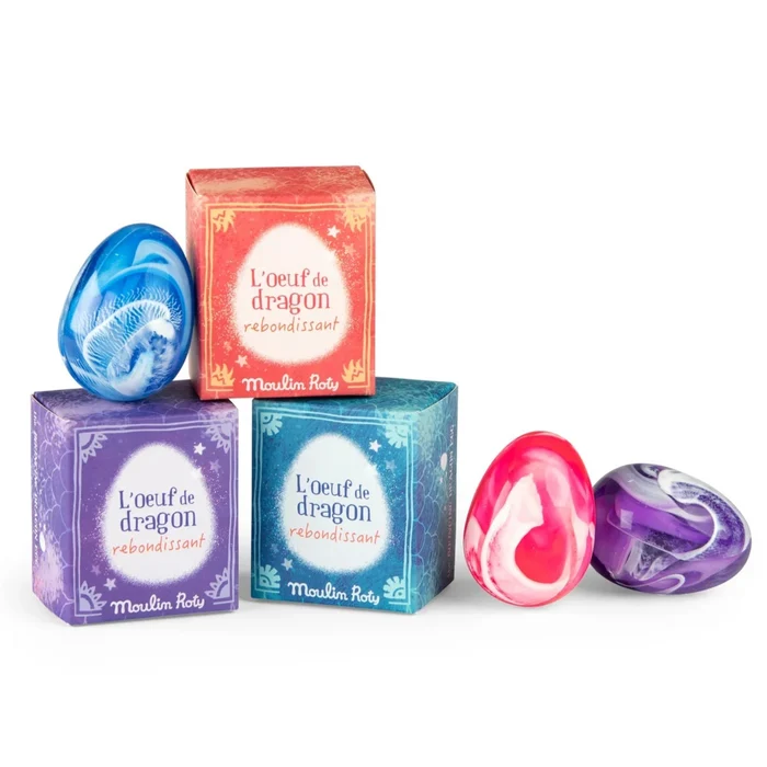 Colorful dragon eggs and boxes on a white background