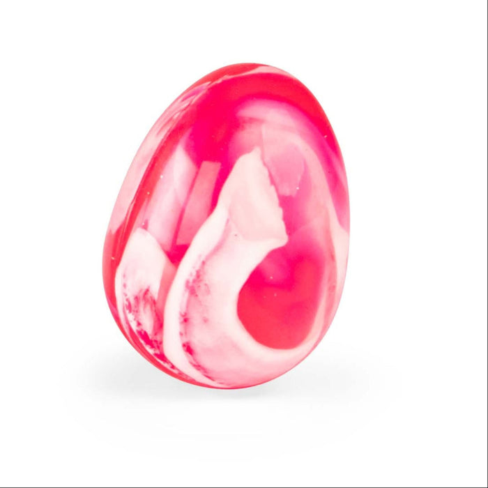 Pink and white marbled object on a white background