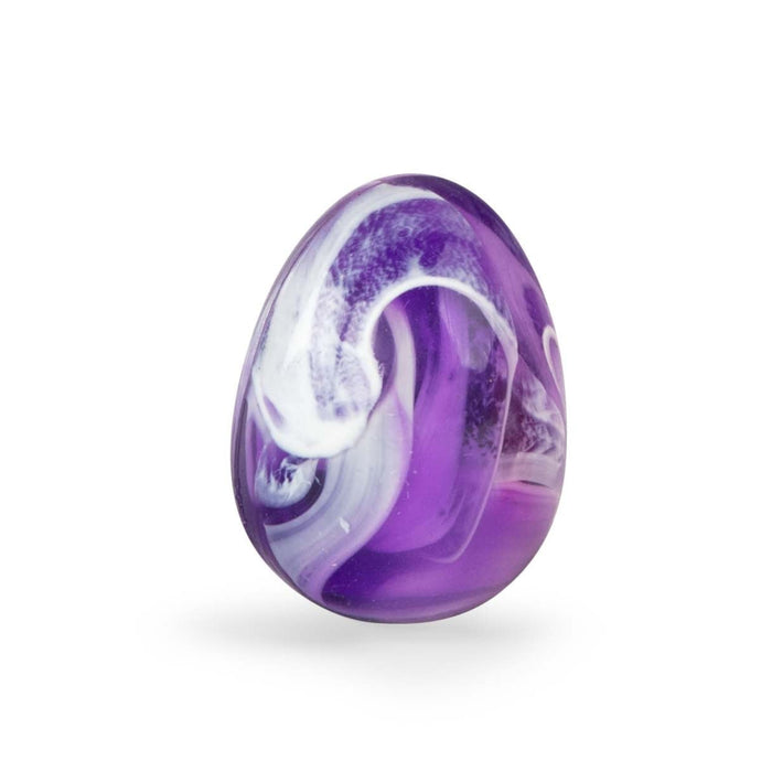 Purple and white marbled rubber egg on a white background