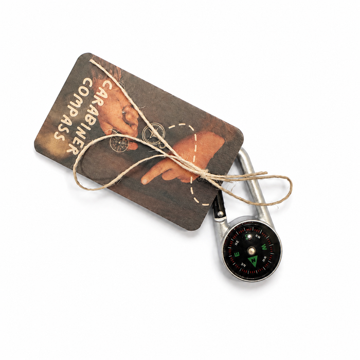 compass with carabiner clip and  vintage-style retail card on a white background