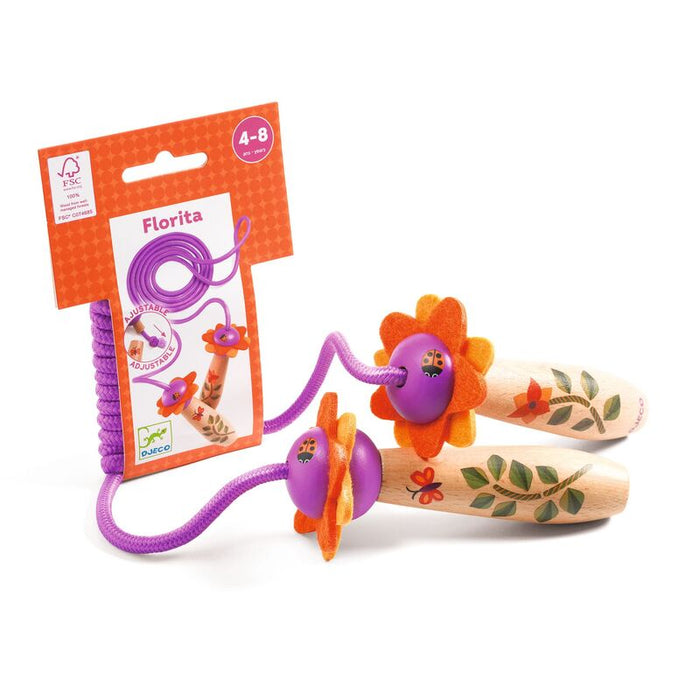 Child playing outdoors with the Djeco Florita adjustable skipping rope