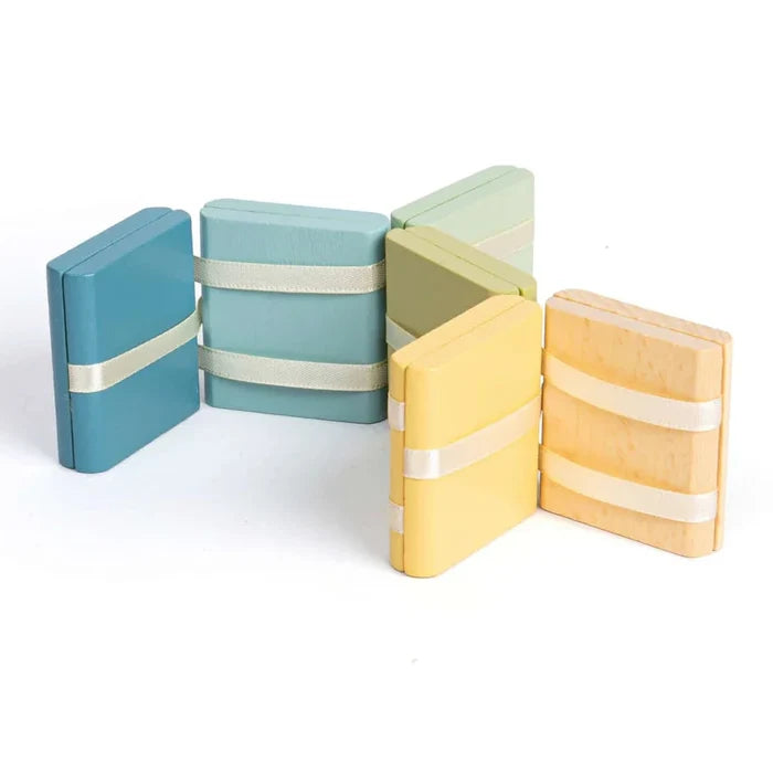 Blue and yellow wooden jacobs ladder toy on a white background
