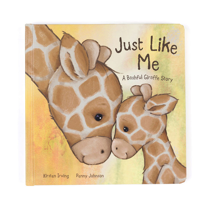 Cover of the 'Just Like Me' book featuring illustrations of a giraffe and her calf with the title text above.
