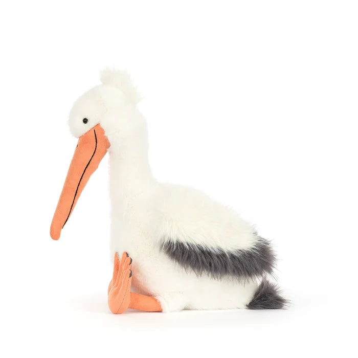 Stuffed pelican toy on a white background