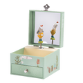 A musical jewellery box with a rabbit and foliage design, open, showing the interior with a wind-up mechanism and a small drawer.