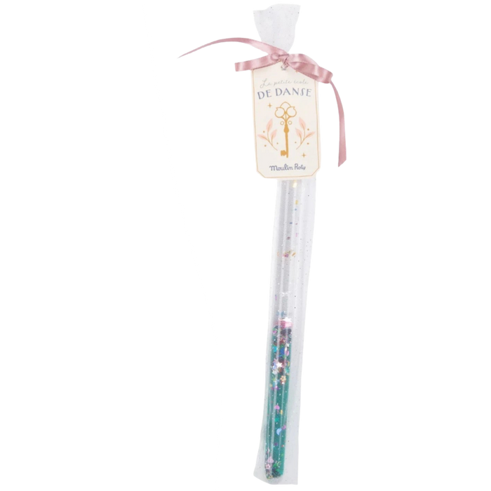 A green magic wand made of plastic/acrylic tube with a clear gel and green glitter, presented in a tulle bag with a satin ribbon.