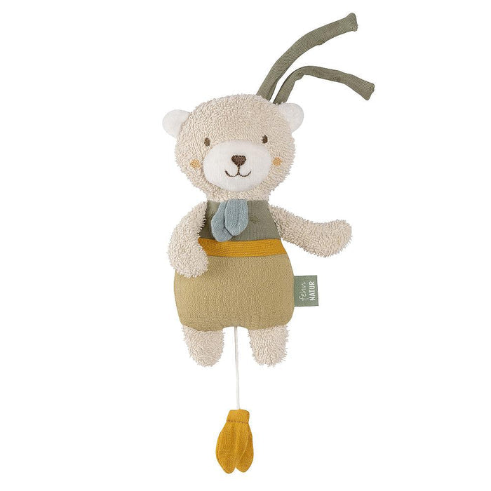 A plush toy resembling a bear with a musical mechanism, primarily in beige and brown colors, with a blue bow tie and yellow feet.