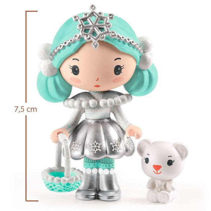 Toy figure with turquoise hair and silver outfit holding a small white bear, with dimensions indicated.