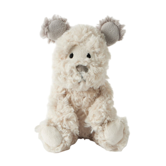 Plush toy dog with gray ears on a white background